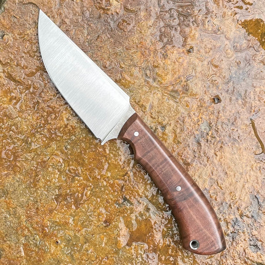 Hunter in CPM154 w/ Curly Walnut