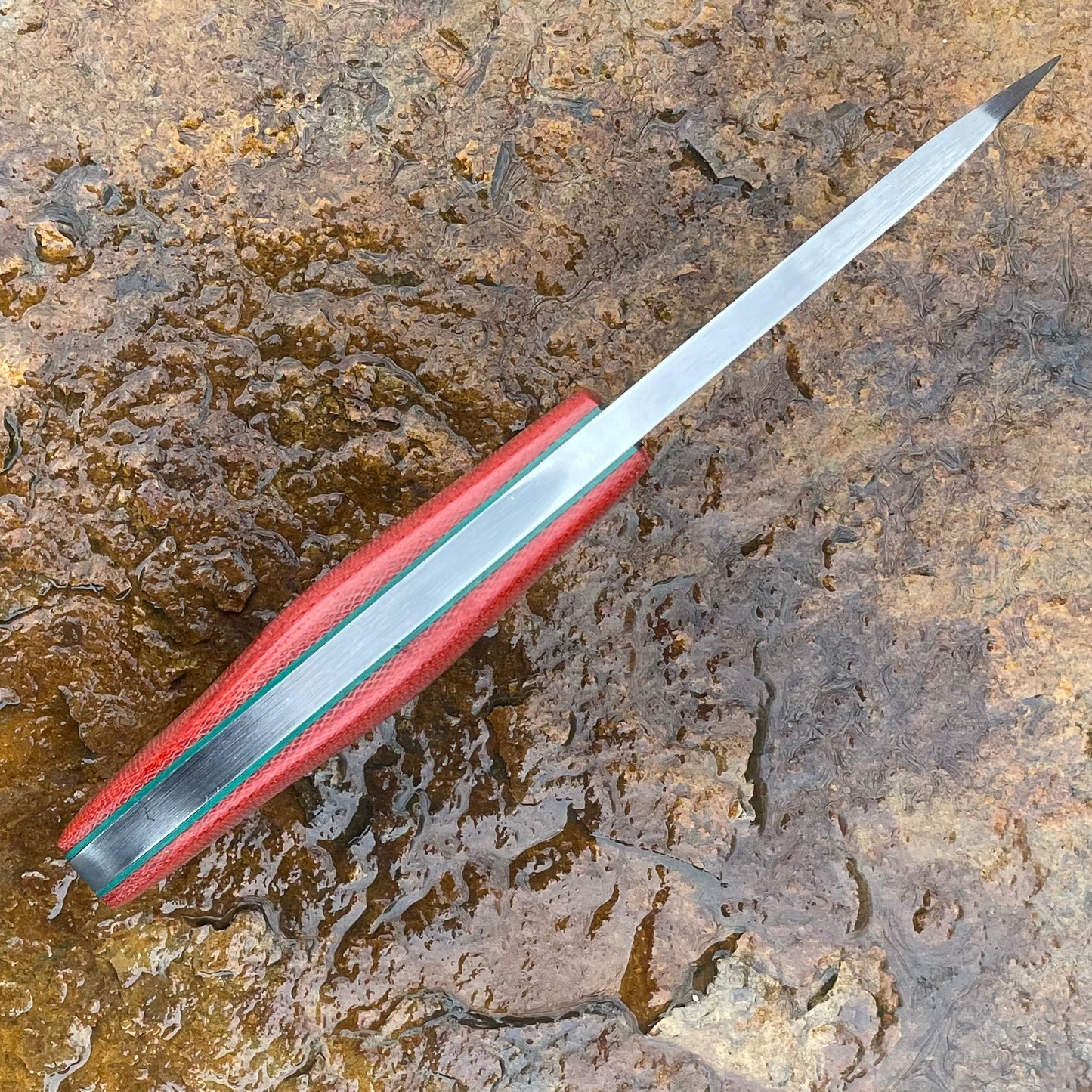 Skinner in 5160 w/ Red Canvas Micarta